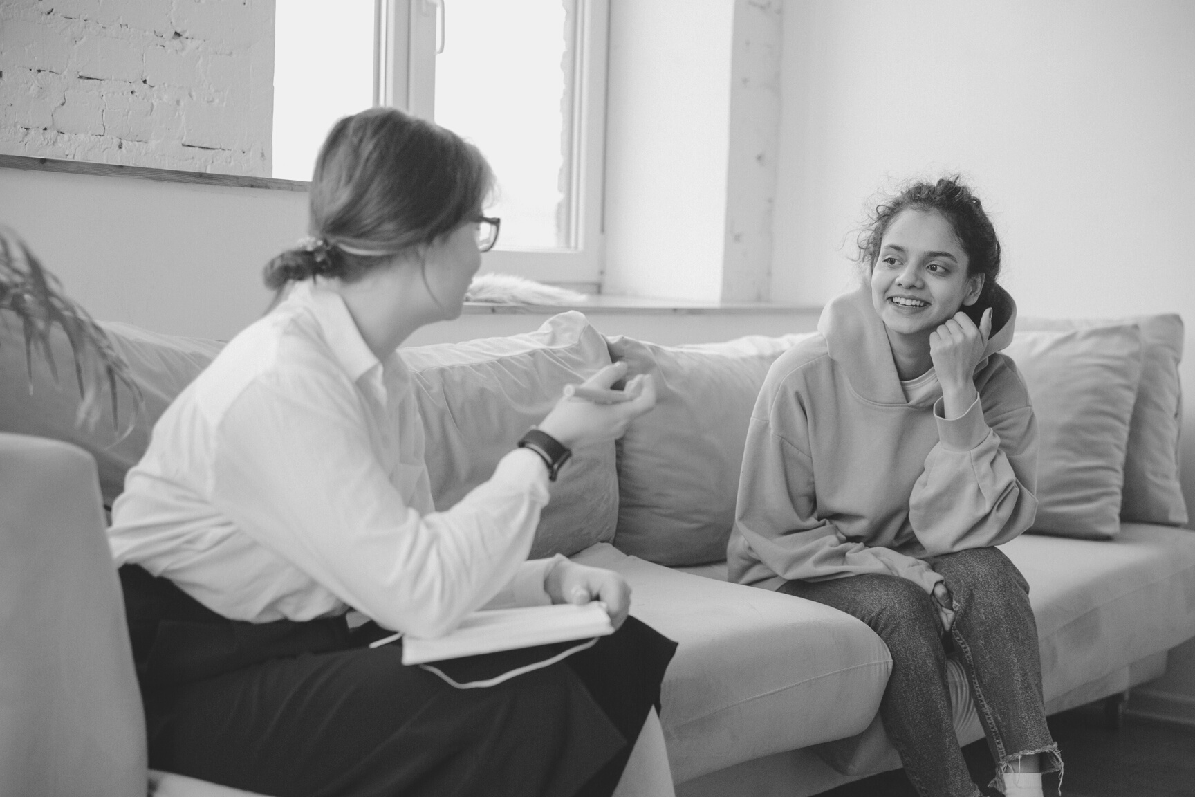 Young Woman Talking with Therapist